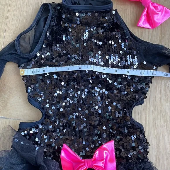 Dance costume competitive, parade sporting events. Black & pink sequin romper
